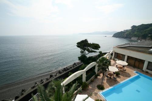 a view of the ocean from a hotel at Tabinoyado Ushionoakari Geiboso in Shima