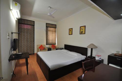 Postel nebo postele na pokoji v ubytování New Delhi YMCA Tourist Hostel