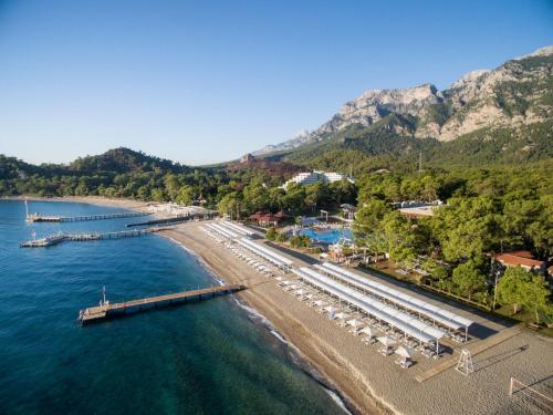 an aerial view of a beach with a dock at Kimeros Park Holiday Village - Ultra All Inc. Kids Concept in Kemer