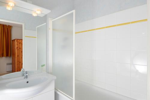 Ванная комната в Résidence Odalys Mille Soleils