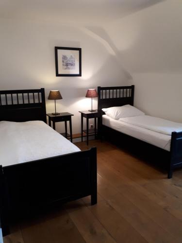 Llit o llits en una habitació de Wildenauer's