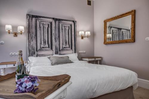 Katil atau katil-katil dalam bilik di Hotel & Spa Pałac Mała Wieś