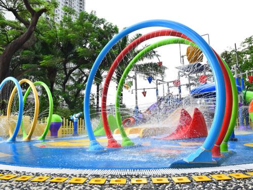 a water park with a colorful water fountain at Shangri-La Jakarta in Jakarta