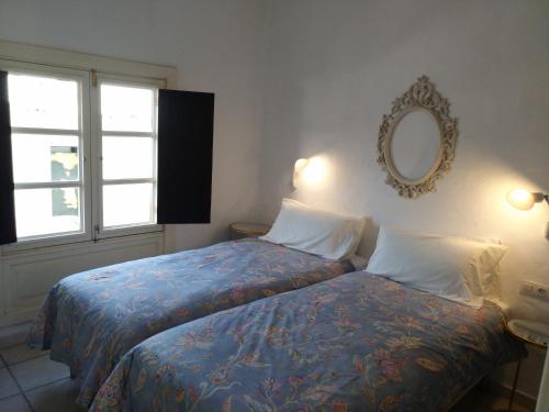 Katil atau katil-katil dalam bilik di Apartamento La Plaza de Haria