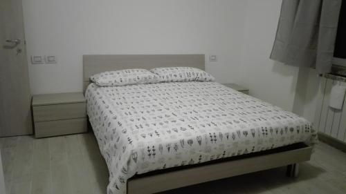 Ліжко або ліжка в номері Rocca sul Lago