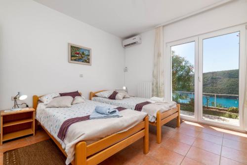 Apartments with parking space Rabac, Labin - 7410