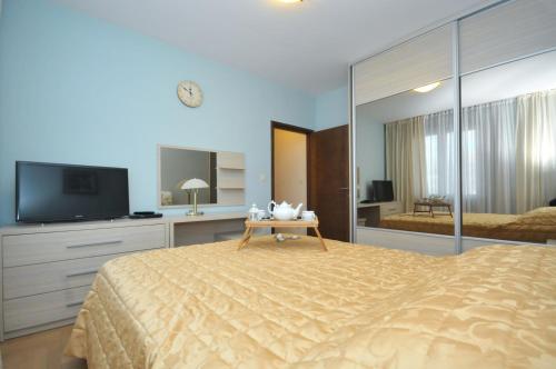 Postel nebo postele na pokoji v ubytování Apartments Spas