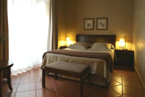 Un ou plusieurs lits dans un hébergement de l'établissement Bremon Boutique Hotel by Duquessa Hotel Collection