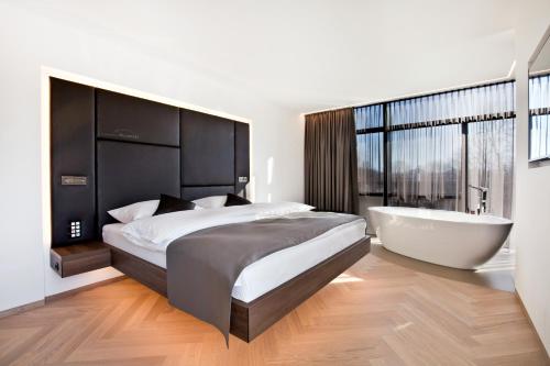 سرير أو أسرّة في غرفة في COOL MAMA Salzburg