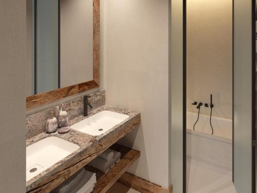 Appartement rustique avec cheminée, terrasse et garage à Val d'Isère