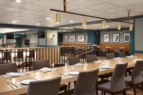 a conference room with a long table and chairs at Fairmont Château Lake Louise in Lake Louise