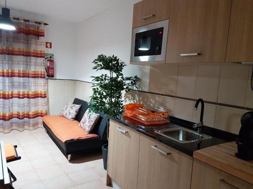A cozinha ou kitchenette de Villa Oliveira Apartments