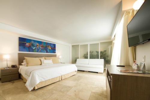 Postel nebo postele na pokoji v ubytování Hotel Casablanca