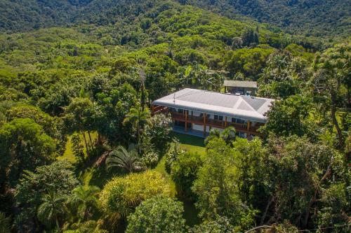 an aerial view of a house in the forest at Daintree Manor B&B in Daintree
