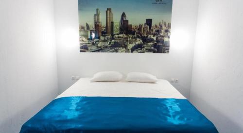 
Кровать или кровати в номере Апартаменты Global Sky
