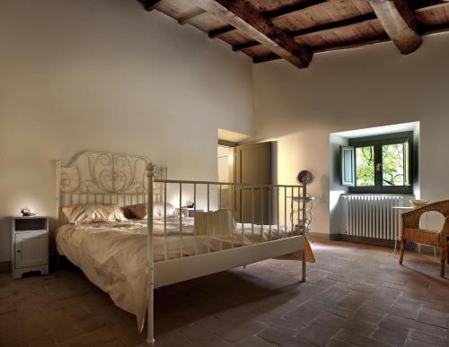 Postel nebo postele na pokoji v ubytování Agriturismo Le Dogane