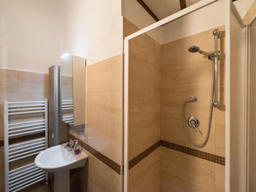 a bathroom with a shower and a sink at Il Quartierino d'Oltrarno in Florence