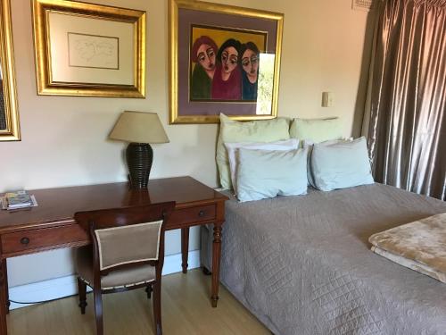 Postel nebo postele na pokoji v ubytování Edens Guest House