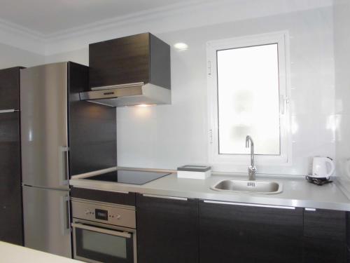 Dapur atau dapur kecil di Apartamentos Bruja