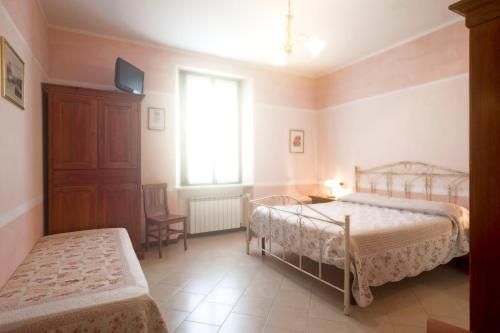 Ένα ή περισσότερα κρεβάτια σε δωμάτιο στο Villa Dircea