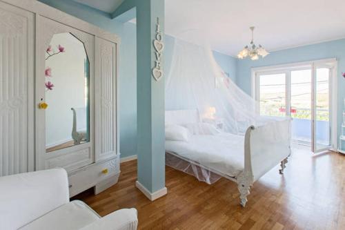 Säng eller sängar i ett rum på CAMINHOS DE SANTIAGO - VillaMaria BEACH HOUSE