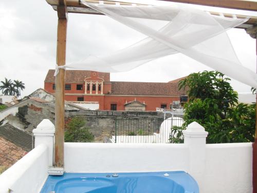 a view from the balcony of a house with a pool at Casa Abril II in Cartagena de Indias