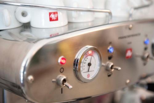 a close up of a kitchen appliance with a clock at A due Passi in Forte dei Marmi