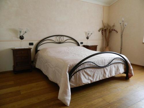 Ένα ή περισσότερα κρεβάτια σε δωμάτιο στο Podere la Campagnola