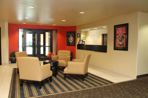 a waiting room with chairs and a table at Extended Studio Hotel Suites - Los Angeles - San Dimas in San Dimas