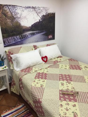 Postel nebo postele na pokoji v ubytování Casinha de Pedra