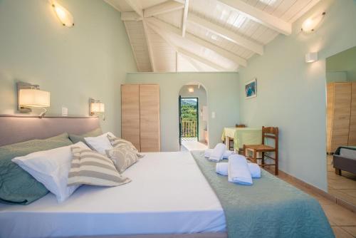 Ένα ή περισσότερα κρεβάτια σε δωμάτιο στο Herodotos Studios