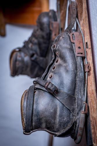 an old leather boot hanging on a table at Haus Mösenlechner in Maishofen