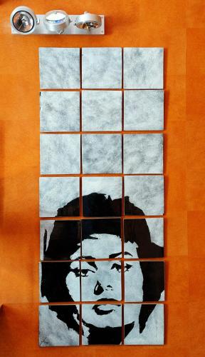 a poster of a man on a wall at Palazzo Ferraioli - Hotel & Wellness in Atrani