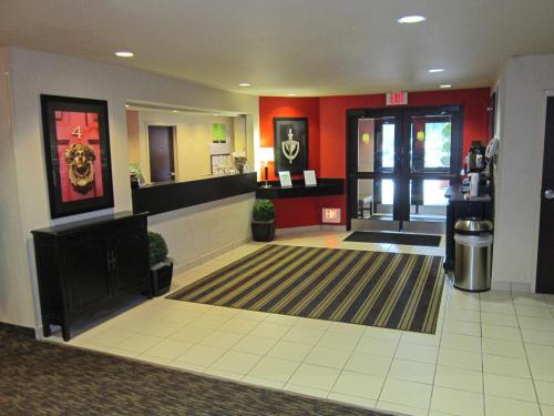 a lobby of a hotel with a waiting room at Extended Stay America Select Suites - Orlando - Maitland - 1760 Pembrook Dr in Orlando