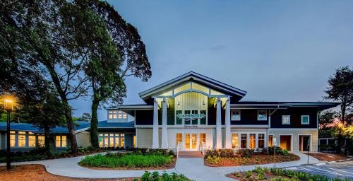 a house with a blue and white building at Hilton Vacation Club Beachwoods Kitty Hawk in Kitty Hawk