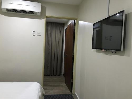 TV a/nebo společenská místnost v ubytování Tambun Inn Hotel