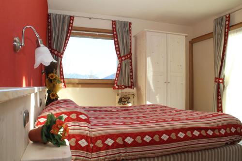 Кровать или кровати в номере Agriturismo Raethia
