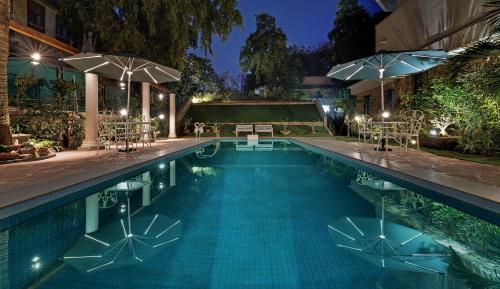 สระว่ายน้ำที่อยู่ใกล้ ๆ หรือใน WelcomHeritage Mani Mansion