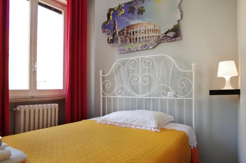 Ein Bett oder Betten in einem Zimmer der Unterkunft B&B Stazione37