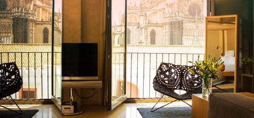 Televisyen dan/atau pusat hiburan di EME Catedral Mercer Hotel