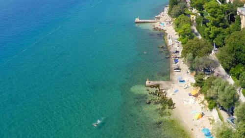 an aerial view of a beach and the ocean at Rooms Villa Harmonie - Adults Only +14 in Crikvenica