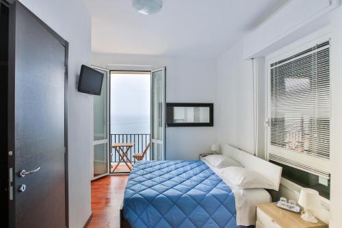 Кровать или кровати в номере Sollevante Guest House