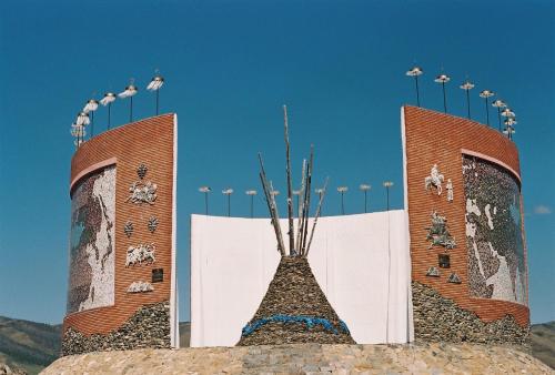 a building with two towers with clocks on them at Gaya's Guest House in Harhorin