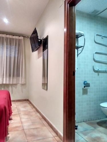 a bathroom with a sink and a shower at Camino de las Bardenas in Arguedas