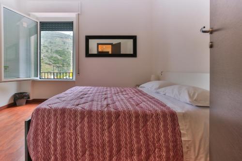 Postel nebo postele na pokoji v ubytování Sollevante Guest House