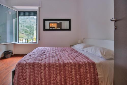 Postel nebo postele na pokoji v ubytování Sollevante Guest House