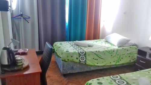 Katil atau katil-katil dalam bilik di The Quiet Corner Guest House