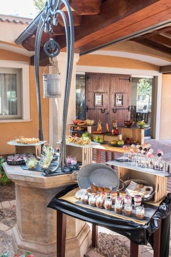 a buffet of food on a table in a kitchen at Occidental Playa de Palma in Playa de Palma