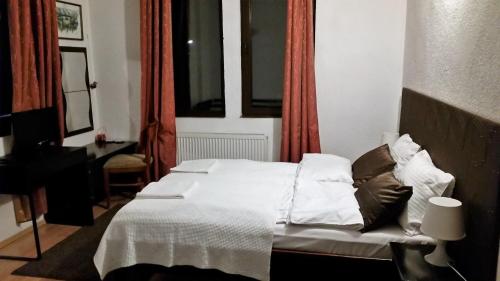 Postel nebo postele na pokoji v ubytování Guest house Elit