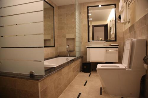 A bathroom at Raoum Inn Khafji Corniche